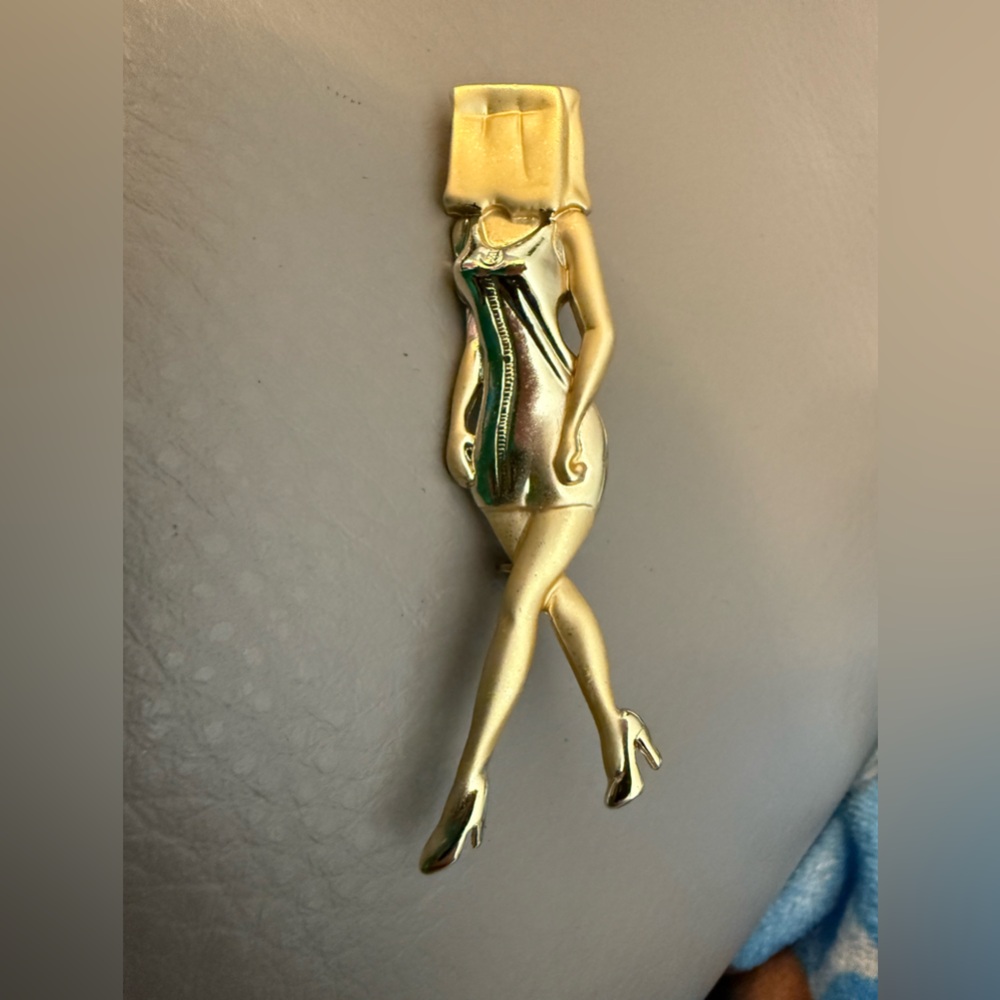 Gold Figurine Brooch